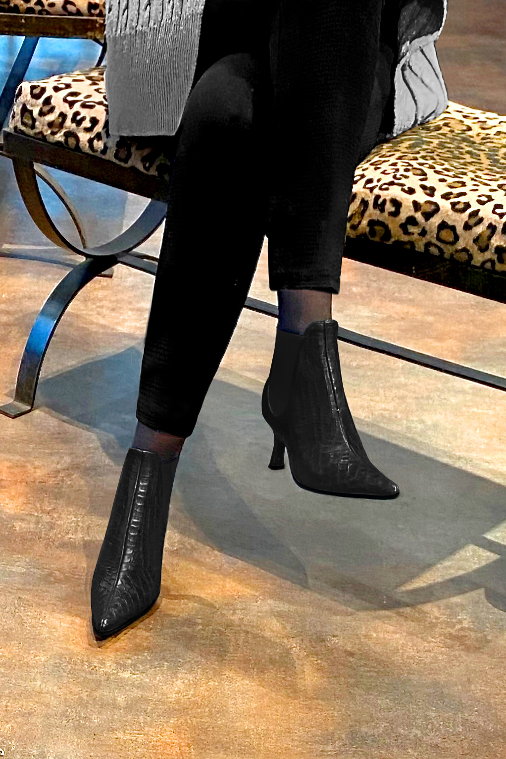 Satin black women's ankle boots, with elastics. Pointed toe. Medium spool heels. Worn view - Florence KOOIJMAN